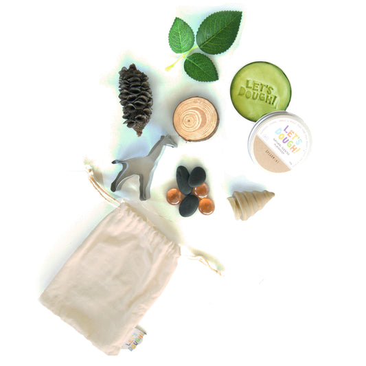 Wild Safari Sensory Bag with non-toxic playdough, wooden slice, safari cutter, and natural accessories for educational play.